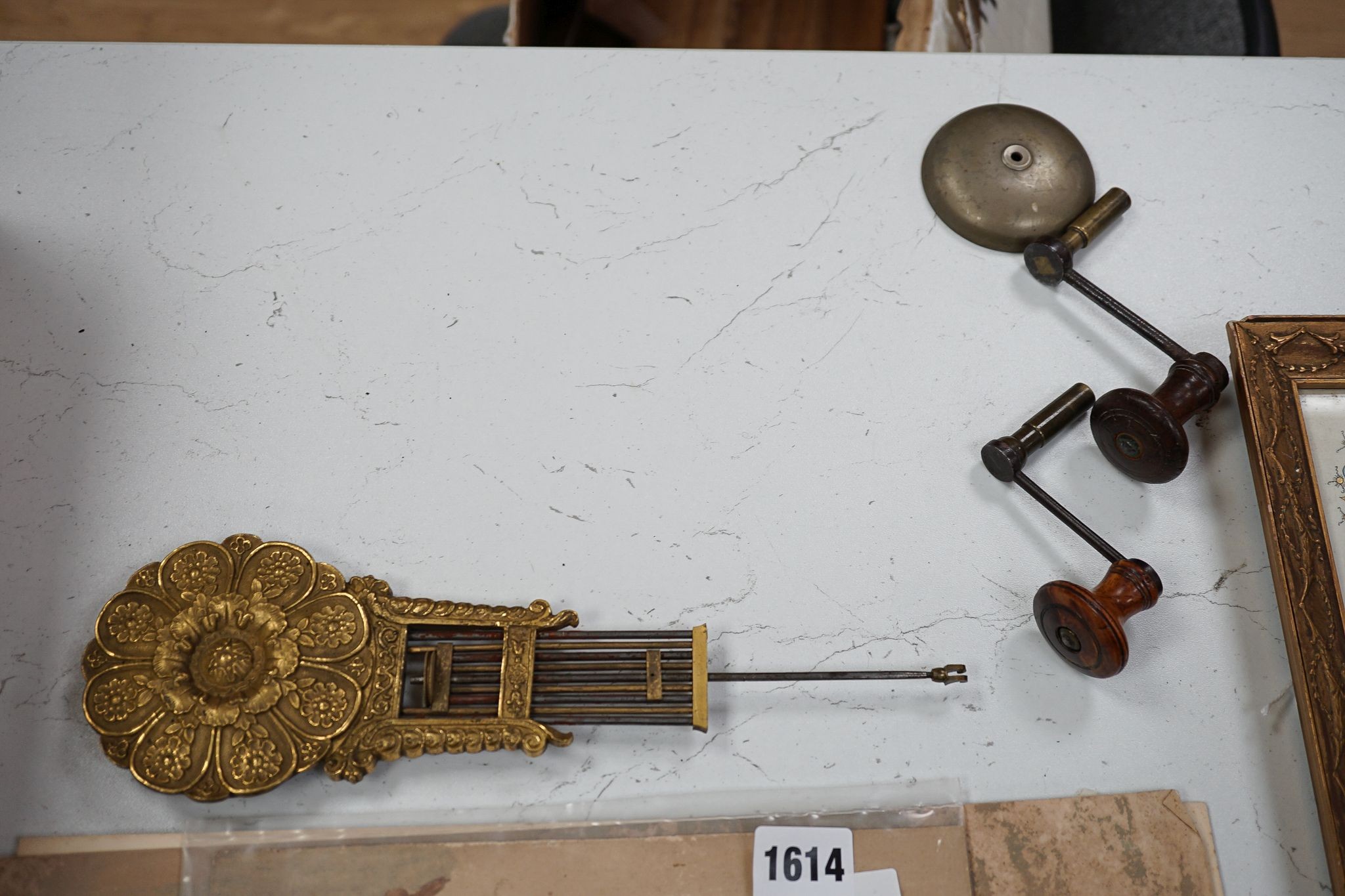 An early 19th century mahogany portico clock with three keys and spare bell, 50cm
